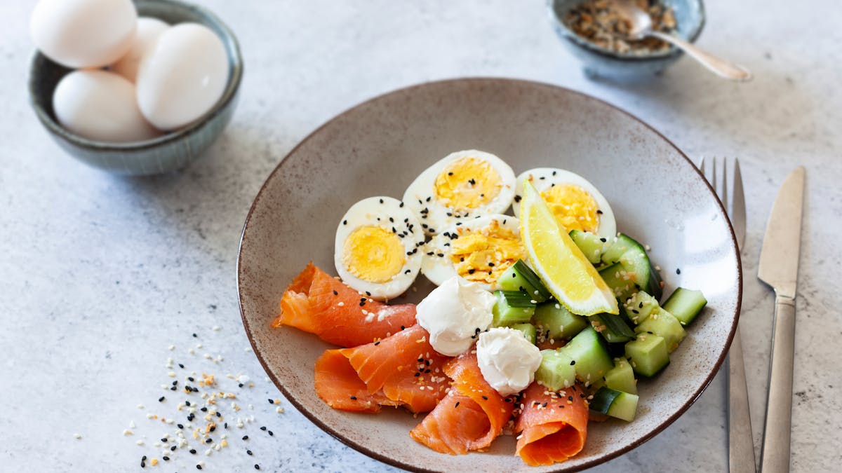 High protein breakfast bowl with eggs and smoked salmon